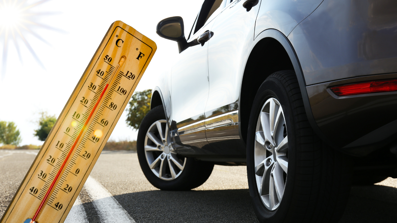 Hot thermometer next to car.