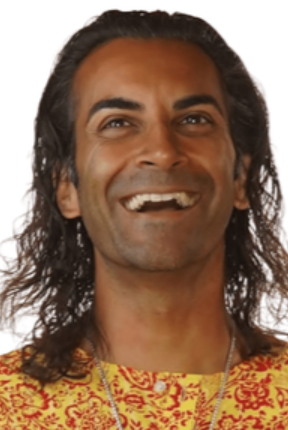 Inderprit Sekhon smiling in a yellow-and-red patterned shirt against a white background.