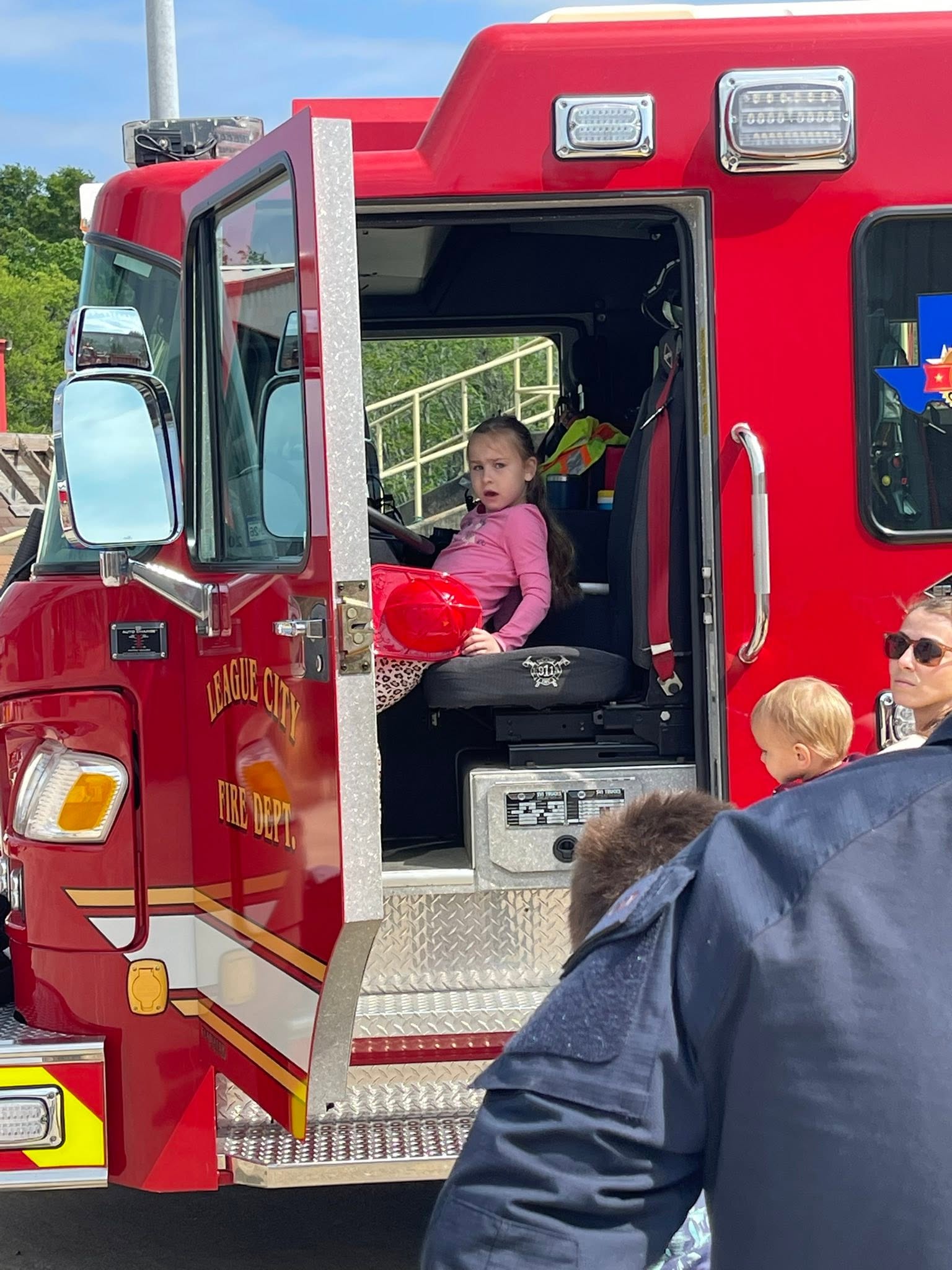 girl in a fire truck