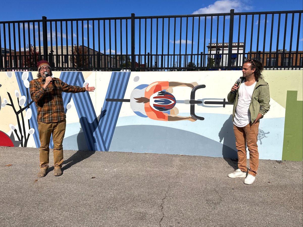 Wheaton College Art Professor Jeremy Botts and his former student Jeffrey Swider-Peltz for their 272-foot-long mural about City of Wheaton’s history.