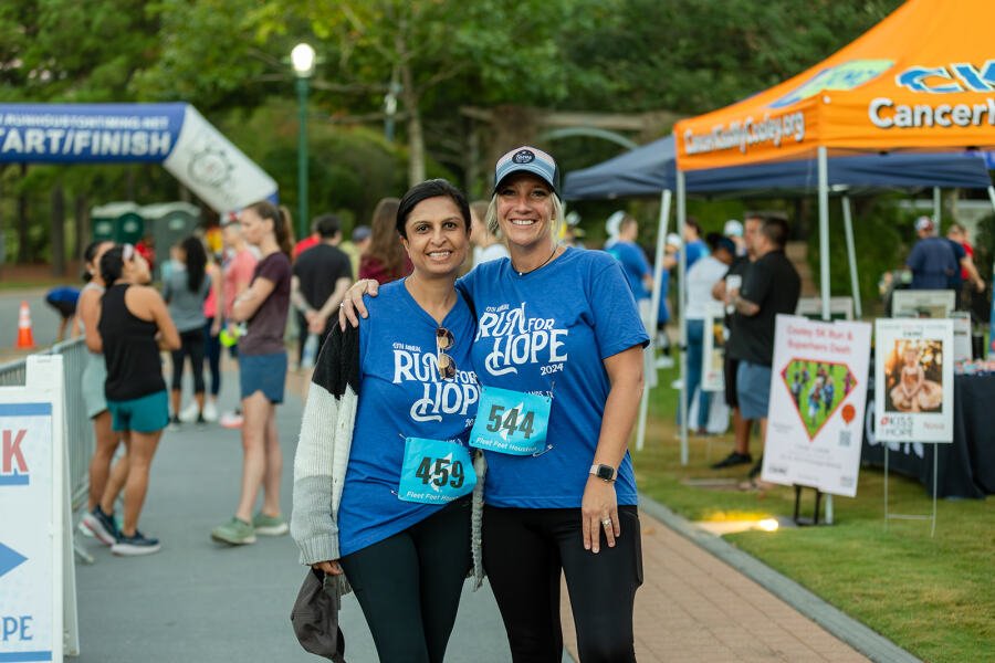 two women pose for photo at the run for hope