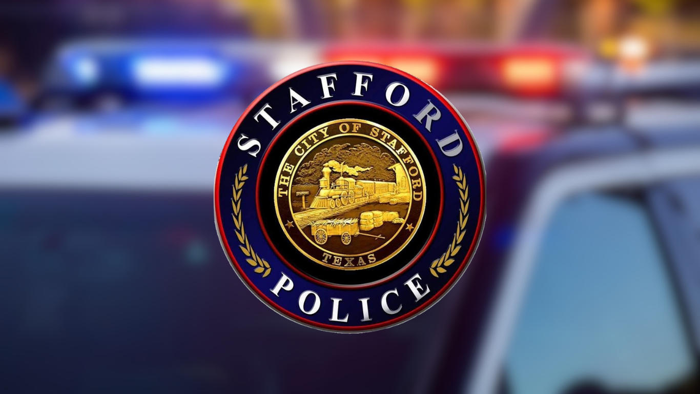 Stafford TX police department logo on blurred police lights background